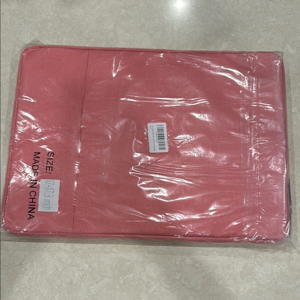 Pink Laptop Sleeve. Fits a 17 inch laptop and is padded on the inside.